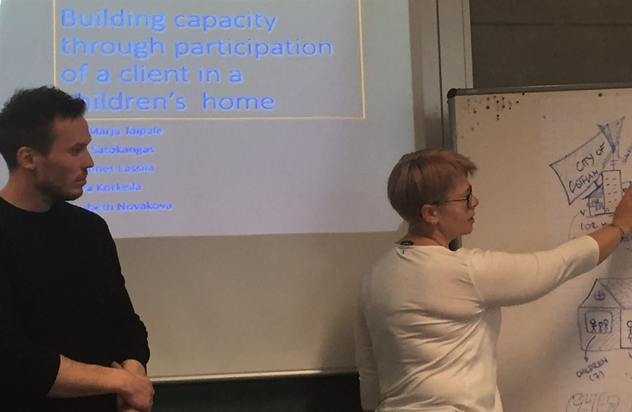 Photo 1. Finnish students presenting capacity building in child care service process (Photo: Päivi Huotari)