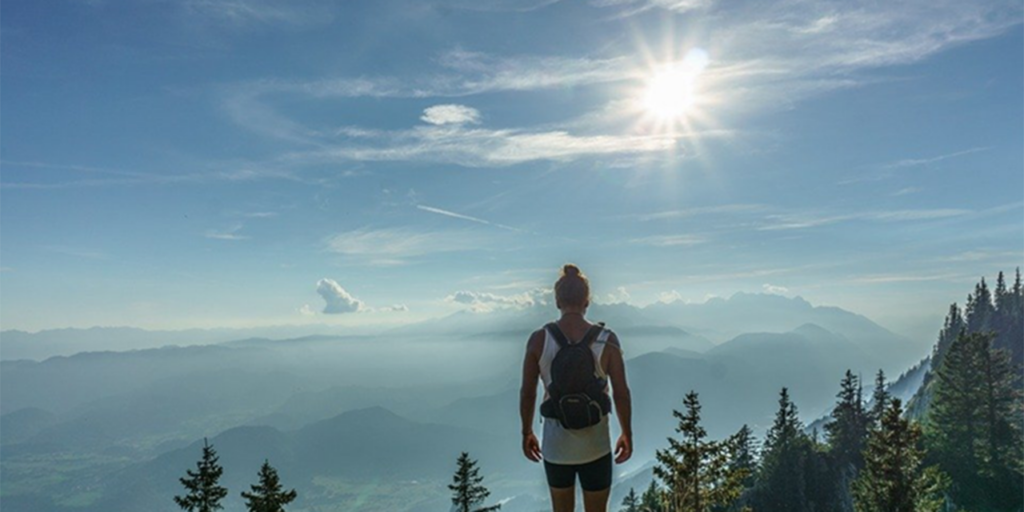 A man standing on a cliff 