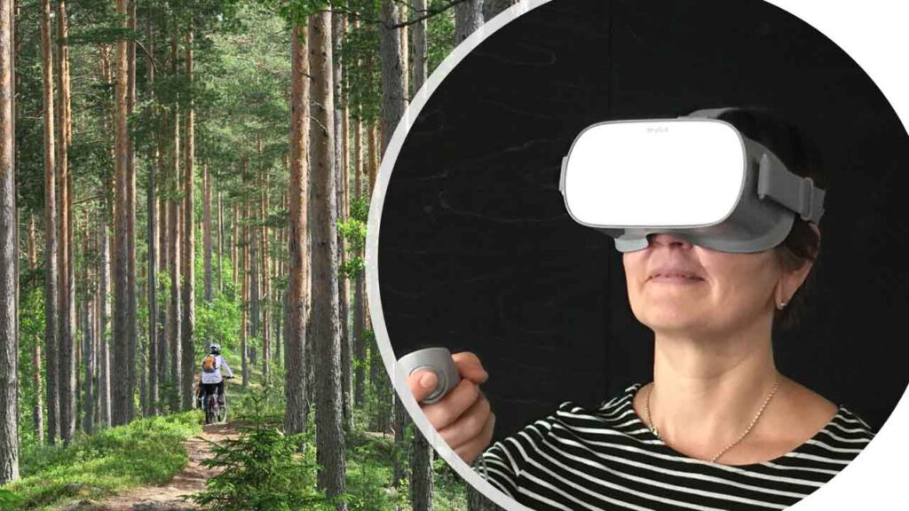[Alt-teksti: Kuva jakautuu kahteen osaan, vasemmalla henkilö pyöräilee kapealla metsäpolulla korkeiden mäntyjen keskellä ja oikealla on henkilö virtuaalitodellisuuslasit päässään ja ohjain kädessään.]