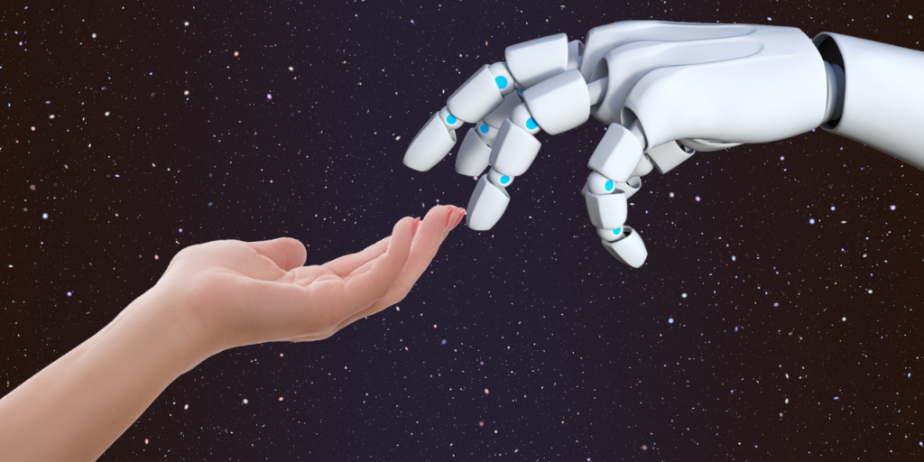 Kuvassa ihmisen käsi ja robotin käsi koskettavat toisiaan. Taustalla tähtitaivas
