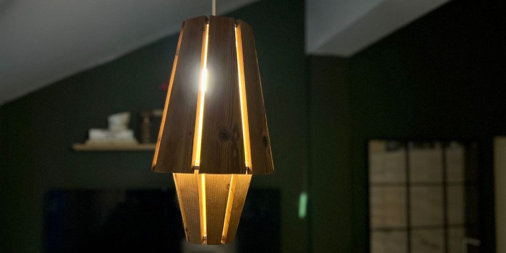 Wooden lamp made from Lunawood B quality boards hanging from the ceiling