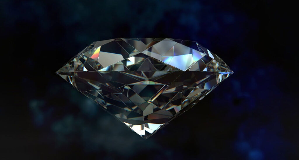 [Alt text: a huge diamond sparkles on black background.]
